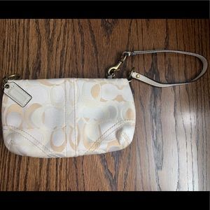 Coach bone and champagne signature canvas wristlet
